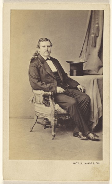 man with moustache seated, a top hat on a nearby table; L. Haase & Co; 1865 - 1870; Albumen silver print