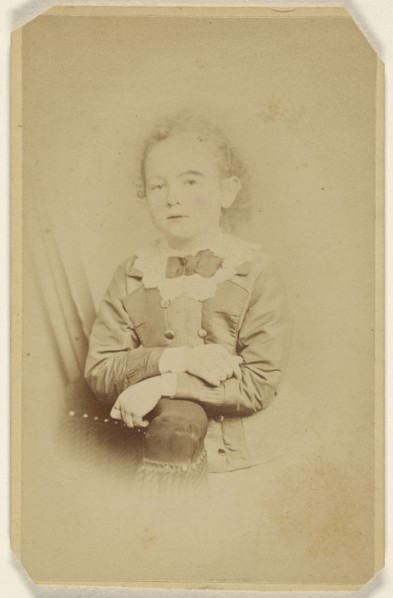 little girl with arms crossed, resting on chair arm, printed in vignette-style; William H. Seeler, American, active Philadelphia