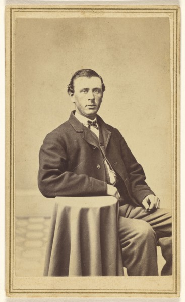 man seated, with arm on small covered table; Frank Forshew, American, 1827 - 1895, 1865-1875; Albumen silver print