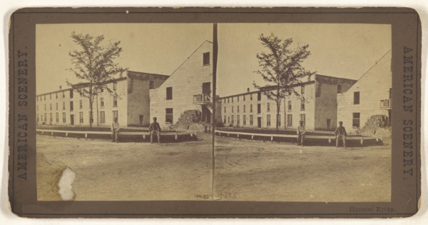 Hudson River. Two men sitting on a railing outside a large building complex; American; about 1870; Albumen silver print
