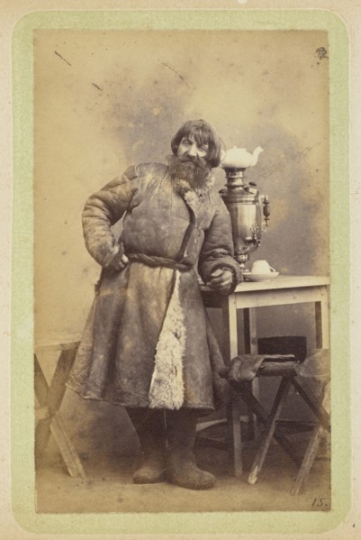 Man in coat leaning on table; William Carrick, Scottish, 1827 - 1878, Russia; about 1860 - 1870; Albumen silver print