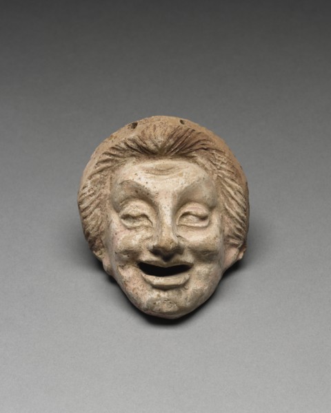 Young Man; Tarentum, Taras, South Italy; 300 - 200 B.C; Terracotta with white slip and polychromy, brownish red, pink