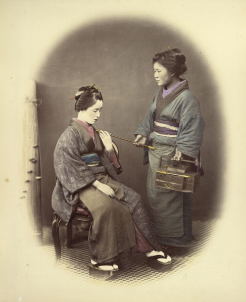 Young Lady, with Pipe; Felice Beato, 1832 - 1909, Japan; 1866 - 1867; Hand-colored Albumen silver print