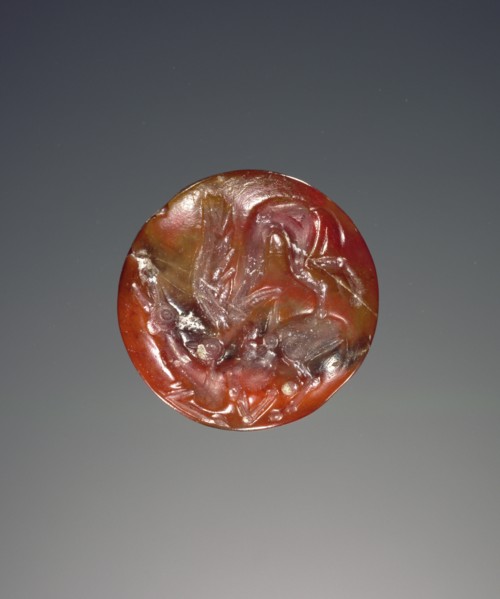 Lentoid engraved seal; Crete, Greece; about 1400 B.C. - 1300 B.C; Carnelian or jasper; 1.5 × 0.9 cm, 9,16 × 3,8 in