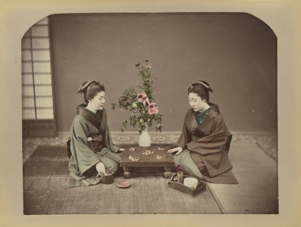 Geisha Playing at Go; possibly Baron Raimund von Stillfried, Austrian, 1839 - 1911, Japan; 1870s - 1890s; Hand-colored Albumen