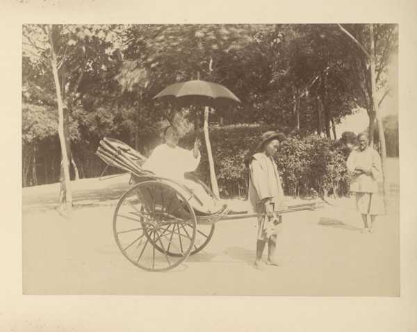 Rickshaw Driver and Passenger with Umbrella; Unknown maker; Peking, China; 1870 - 1890; Albumen silver print