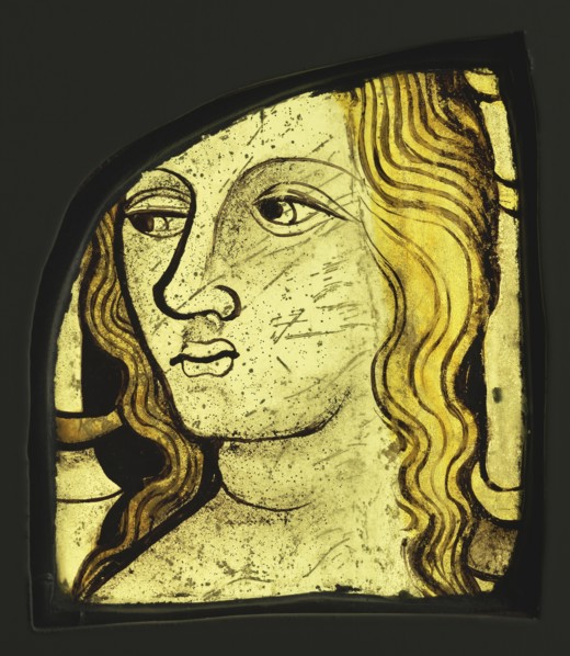 Female Head; English?; England, ?, about 1420 - 1430; Colorless glass, vitreous paint, and silver stain; 15.4 x 11.9 x 1 cm