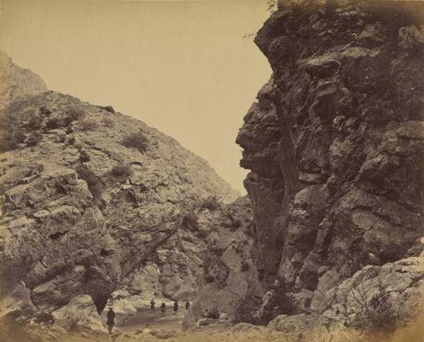 Figures walking path between hills; John Burke, British, active 1860s - 1870s, Afghanistan; 1878 - 1879; Albumen silver print