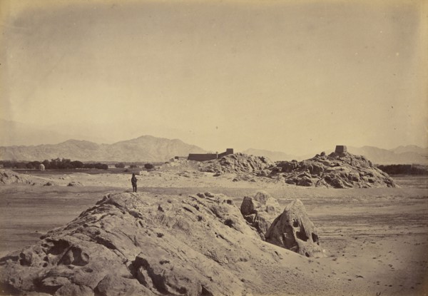Man standing on rocks; John Burke, British, active 1860s - 1870s, Afghanistan; 1878 - 1879; Albumen silver print