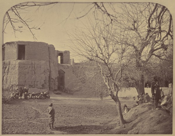 People in front of stone building; John Burke, British, active 1860s - 1870s, Afghanistan; 1878 - 1879; Albumen silver print