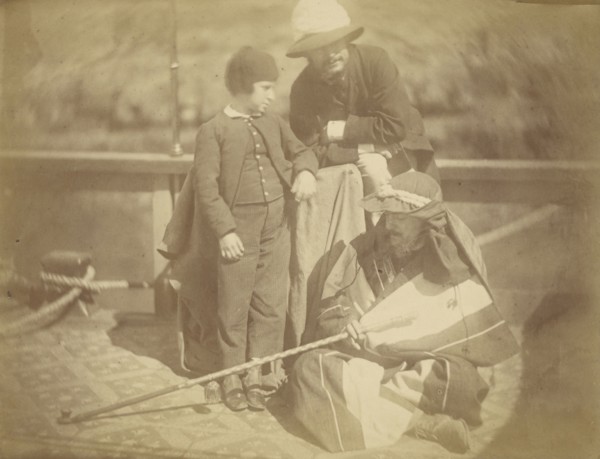 Group Portrait of Two Occidental Men and a Boy on a Boat in the Nile River; Théodule Devéria, French, 1831 - 1871, France; 1865