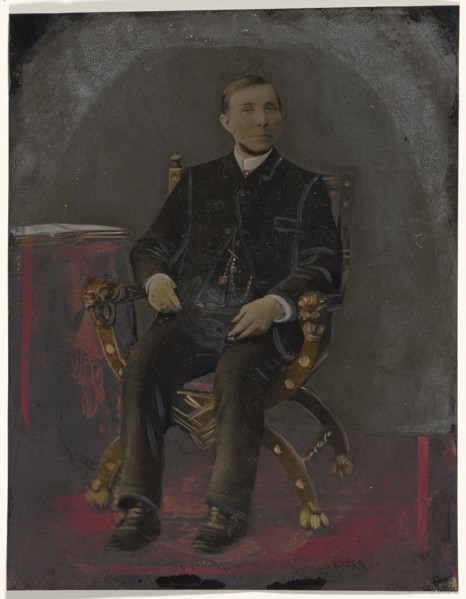 Portrait of seated man; United States; 1860s - 1880s; Hand-colored tintype; Sheet: 21.1 x 16.6 cm, 8 5,16 x 6 9,16 in