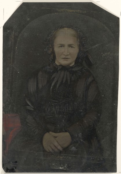 Portrait of woman in black bonnet; United States; 1860s - 1880s; Hand-colored tintype; Sheet: 25.5 x 17.2 cm, 10 1,16 x 6 3,4 in