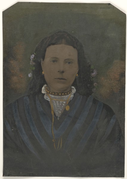 Portrait of young woman; United States; 1860s - 1880s; Hand-colored tintype; Sheet: 25.5 x 17.9 cm, 10 1,16 x 7 1,16 in