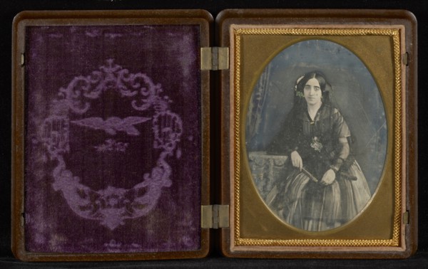 Portrait of Woman in Black with Fan; Mexico; about 1850s; Hand-colored Daguerreotype