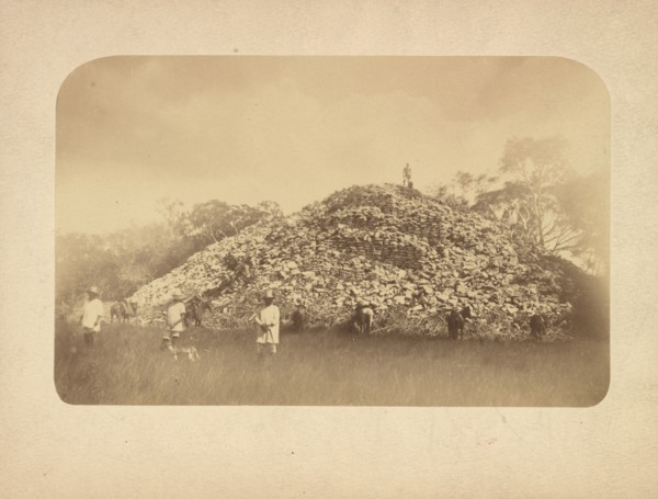 Man standing on top of the mound at Mayapan, Augustus and Alice Dixon Le Plongeon papers, 1763-1937, bulk 1860-1910, Le Plongeon
