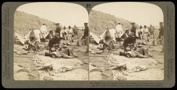 China, Columbia's noble soldier boys- American giving water to Japanese after battle of Tientsin, China, Ricalton, James
