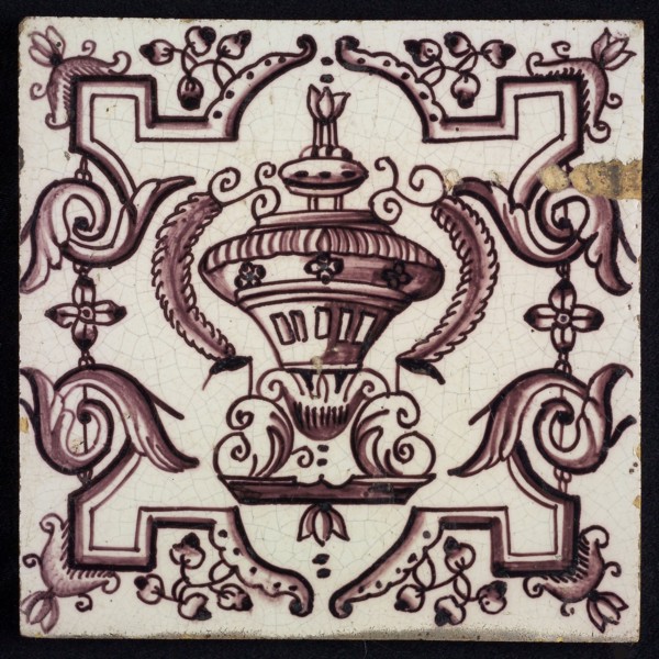Tile, purple on white, vase with round floral ornaments, framed by régence decoration, wall tile tile sculpture ceramic
