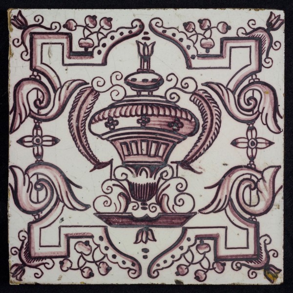 Tile, purple on white, vase with round floral ornaments, framed by régence decoration, wall tile tile sculpture ceramic