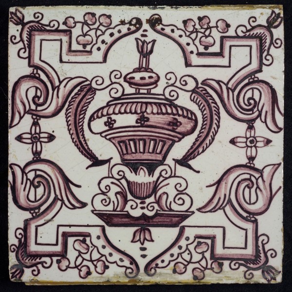Tile, purple on white, vase with round floral ornaments, framed by régence decoration, wall tile tile sculpture ceramic