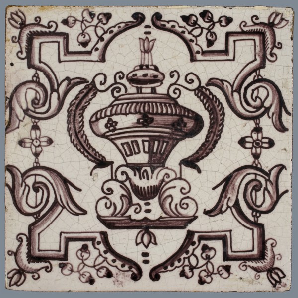 Tile, purple on white, vase with round floral ornaments, framed by régence decoration, wall tile tile sculpture ceramic