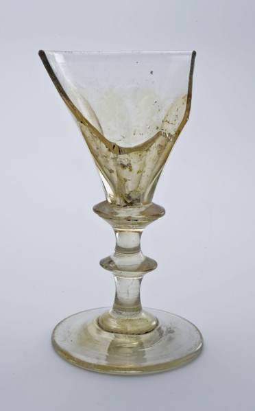 Fragment of foot, trunk and part of calyx of chalice, wine glass drinking glass drinking utensils tableware holder soil find