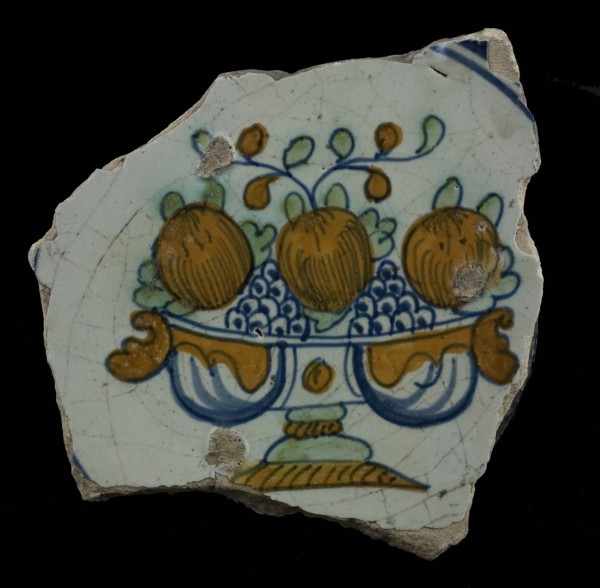 Fragment of the majolica dish, polychrome, fruit bowl on foot with grapes and apples, plate crockery holder soil find ceramic