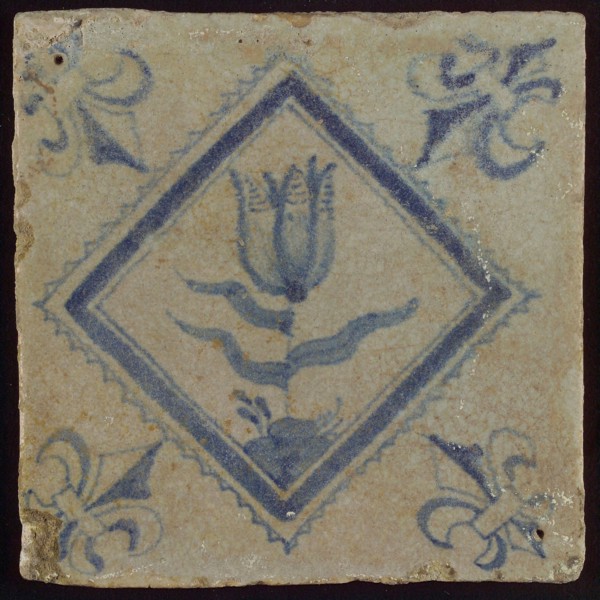 Tile, tulip on ground in blue on white, inside serrated square, corner pattern french lily, wall tile tile sculpture ceramic