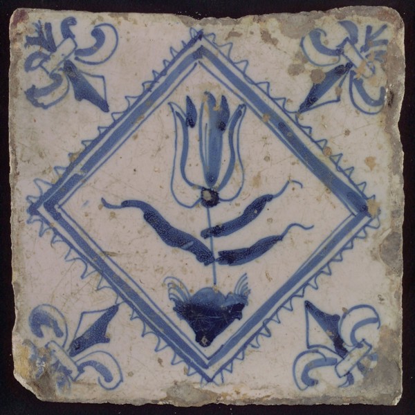 Tile, tulip on ground in blue on white, inside serrated square, corner pattern french lily, wall tile tile sculpture ceramic