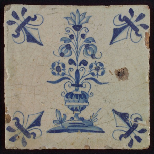 Tile, flowerpot in blue on white, corner pattern french lily, well to the right of the vase, wall tile tile sculpture ceramic