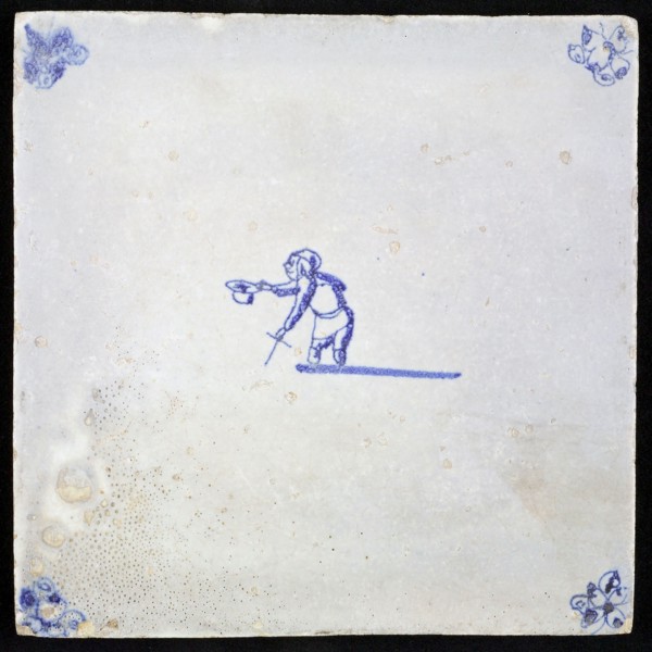 Figure tile, blue with beggar without lower legs, holds his hat, corner motif spider, wall tile tile sculpture ceramic