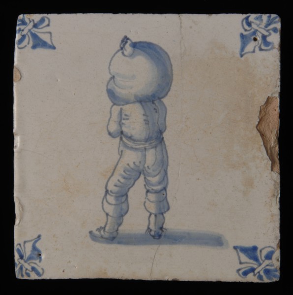 Profession tile, blue with bag carrier, man with bag high on the shoulder, corner pattern lily, wall tile tile sculpture