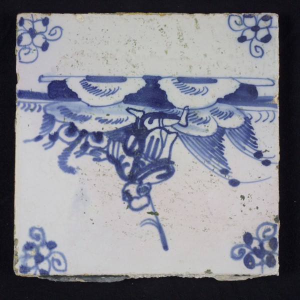 Figure tile, blue with landscape with shepherd kneeling on one knee, corner pattern spider, wall tile tile sculpture ceramic
