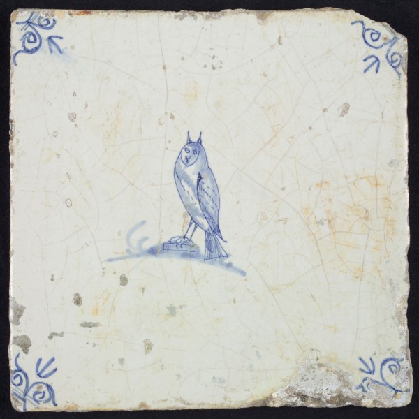 Animal tile, bird on ground to the left, in blue on white, corner motif ox's head, wall tile tile sculpture ceramic earthenware