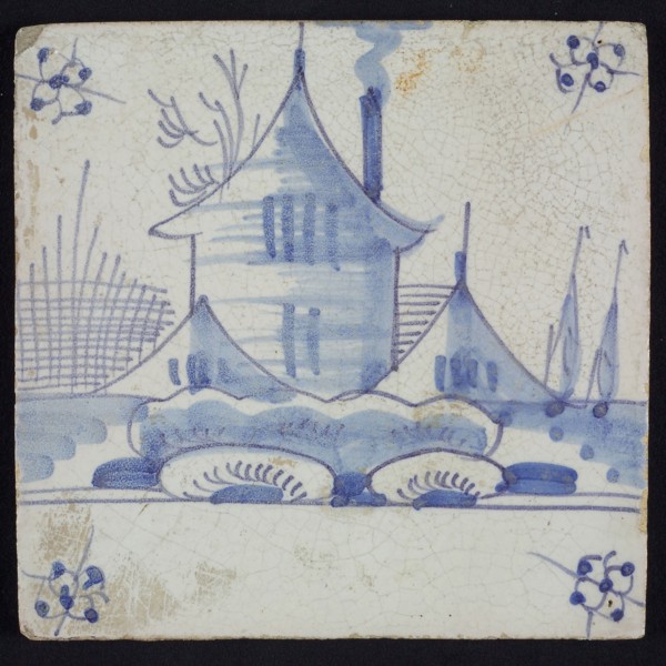Scene tile, blue with landscape with houses and tower, corner motif spider, wall tile tile sculpture ceramic earthenware glaze