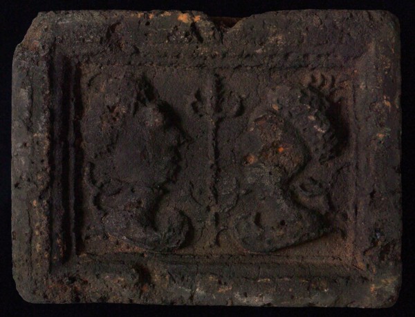 Hearthstone, Luiks, from Luik, Liege Belgium, with wide frame, with male and female head, hearth fireplace part ceramic brick