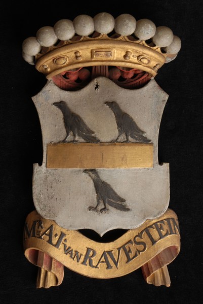 Carved wooden crowned coat of arms including the name Mr. .I. Van Ravestein, coat of arms informative form carvings sculpture
