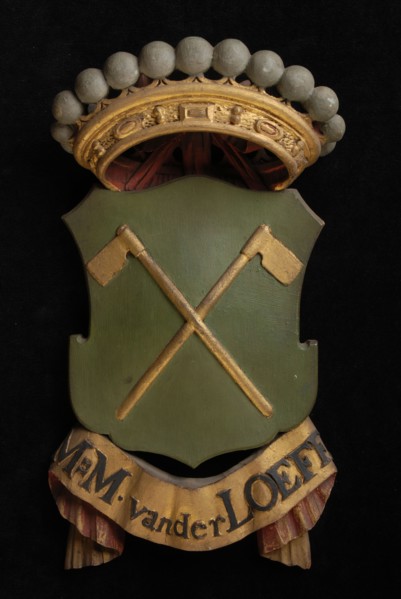 Carved wooden crowned coat of arms including the name M.M. Van der Loeff, coat of arms information form carvings sculpture