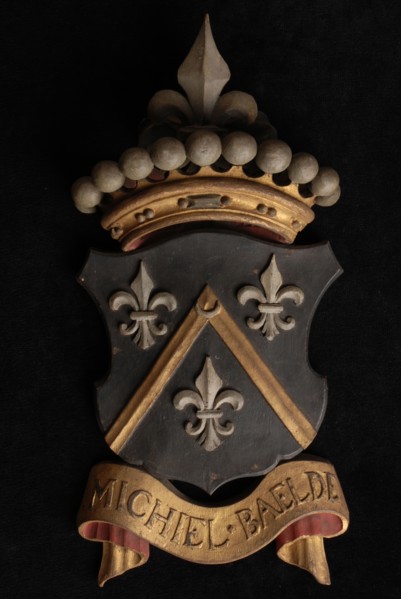Carved wooden crowned coat of arms including the name Michiel Baelde, coat of arms information form carvings sculpture footage
