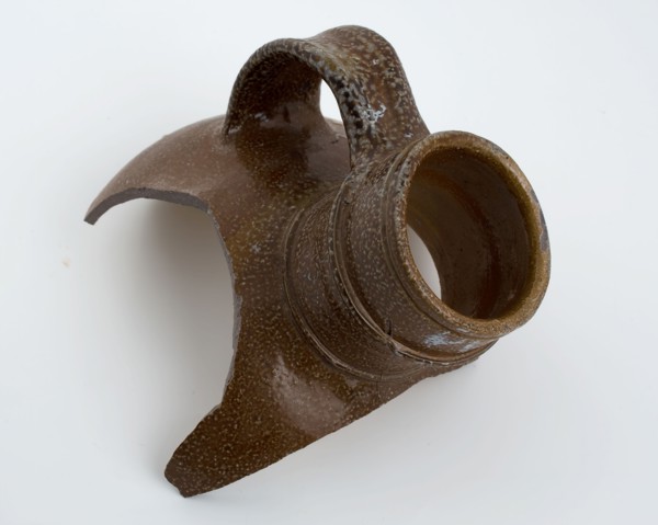 Neck fragment of bullet round stoneware jug with ear, jug crockery holder soil find ceramic stoneware glaze salt glaze, hand