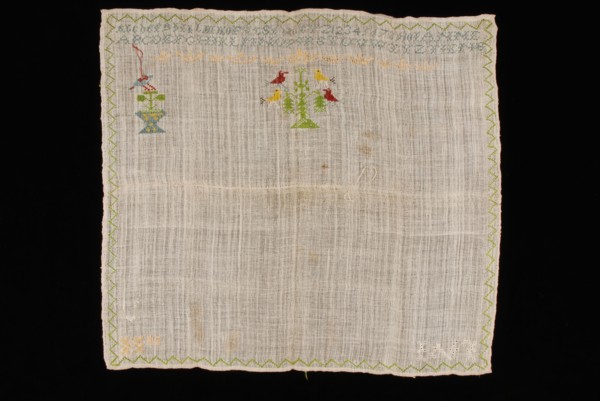 Unfinished sampler or lettercloth worked in cross stitch in colored silk on loose woven unbleached linen, marked LNI, sampler