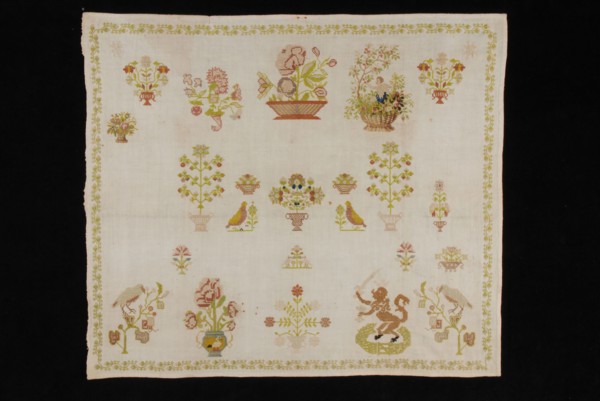 Unfinished sampler worked in fine cross stitch in colored silk on finely woven unbleached cotton, sampler embroidery needlework