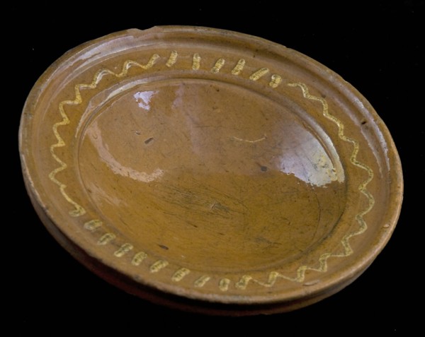 Red earthenware plate or dish with white mud decoration along the edge, stand ring, plate dish crockery holder soil find ceramic
