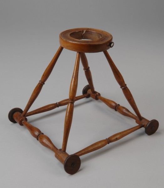Miniature wooden walking frame with square base, pyramid shaped ascending, round wooden waistband with removable piece