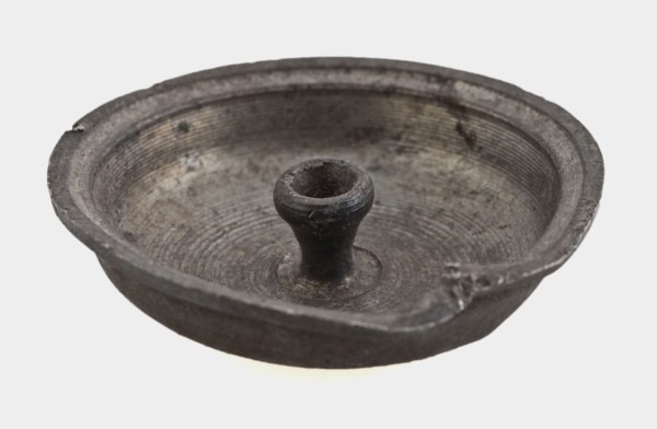 Small tin lid, lid closure soil found metal tin, molded tin lid. Curved flat and protruding edge In the middle at the bottom