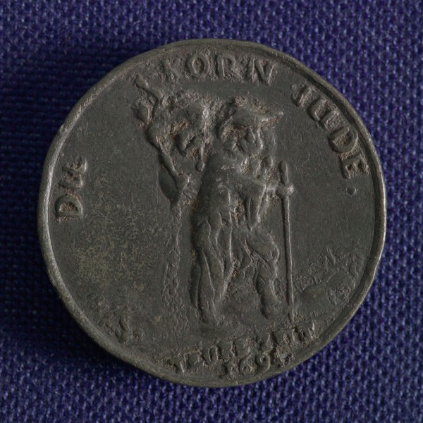 Medal on the increase of grain prices in Germany, medallion medals lead metal, man walking to the right carrying bag