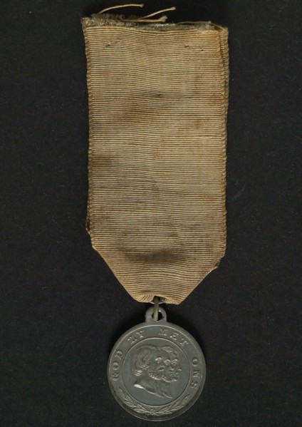 Willem Pauwels en Zoon, Contribution to the Oranjefeest in The Hague, wear medal penning identification carrier tin textile