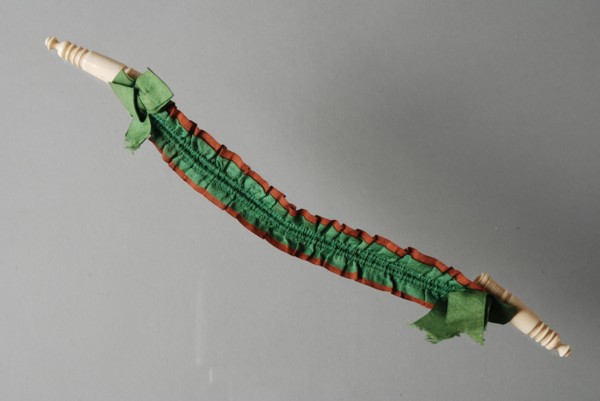 Knitting needle holder, two caps of twisted ivory on elastic brown and green silk band, knitting needles knitting needles holder