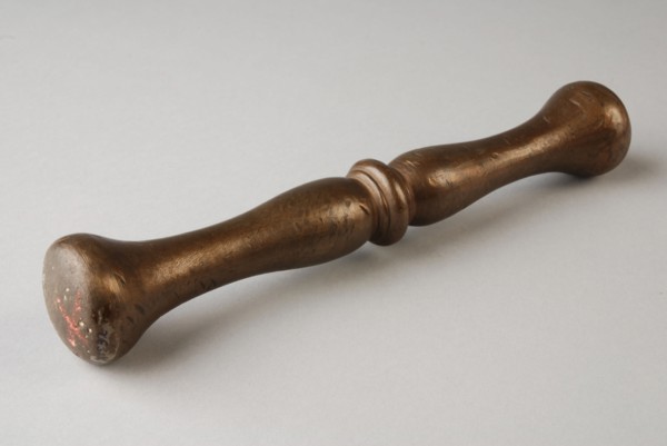 Bronze stamper, pestle tools equipment bronze, cast Pestle: round stem with central node. Bolls on both sides of node.