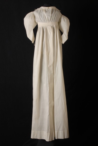 White cotton baby nightgown, with sheepskin sleeves, embroidery stitches mid front, on collar and on belt, nightgown sleepwear